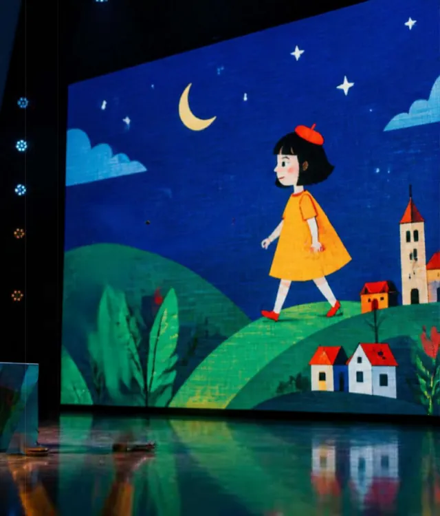 Menina de vestido amarelo caminhando sobre colinas animadas no painel de LED